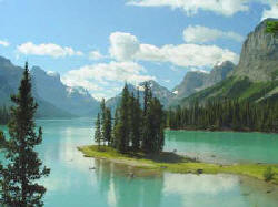 This view of Spirit Island, in Lake Malign near Jasper is one of the top ten views in the world. Boat cruises ply tourists to the far end of Lake Malign to photograph Spirit Island, named for the ethereal quality of the scene. Lake Malign flows into Malign River near the coffee shop. Of note, is that in the spring this is a preserve for HARLEQUIN ducks! The river is opened to the public for rafting after July 1. 