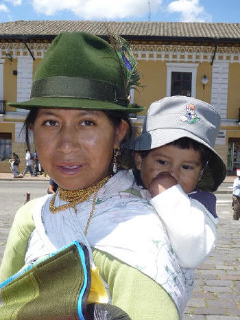 We learned to watch the hats of the Indian women... dark felt hats with the peacock feather, shown here, the white felt hats of the Otavala women.