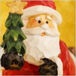 santa_claus_and_christmas_tree_207602