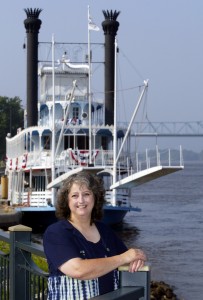 Stoddard, Wis. author Pat Middleton poses in front of the riverboat the Julia Belle Swain on the river front in La Crosse, Wis. Erik Daily